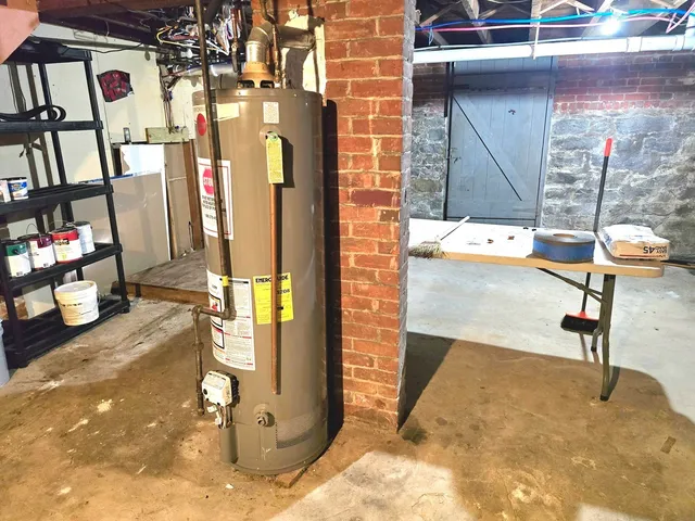 a bathroom with a window and a shower