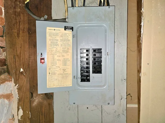 a view of a yard with trees on both side of it