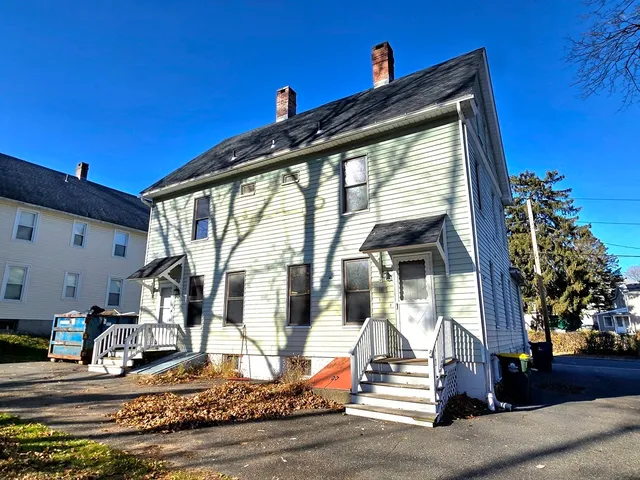 a view of a house with many windows