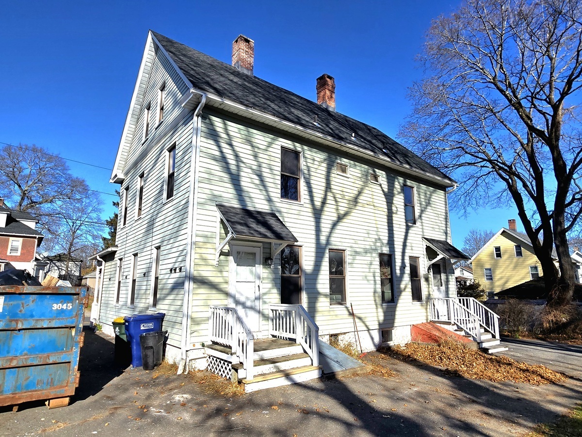 10 Clarkson Street Ansonia, CT 06401 - Photo 34 of 35 a view of a house with many windows