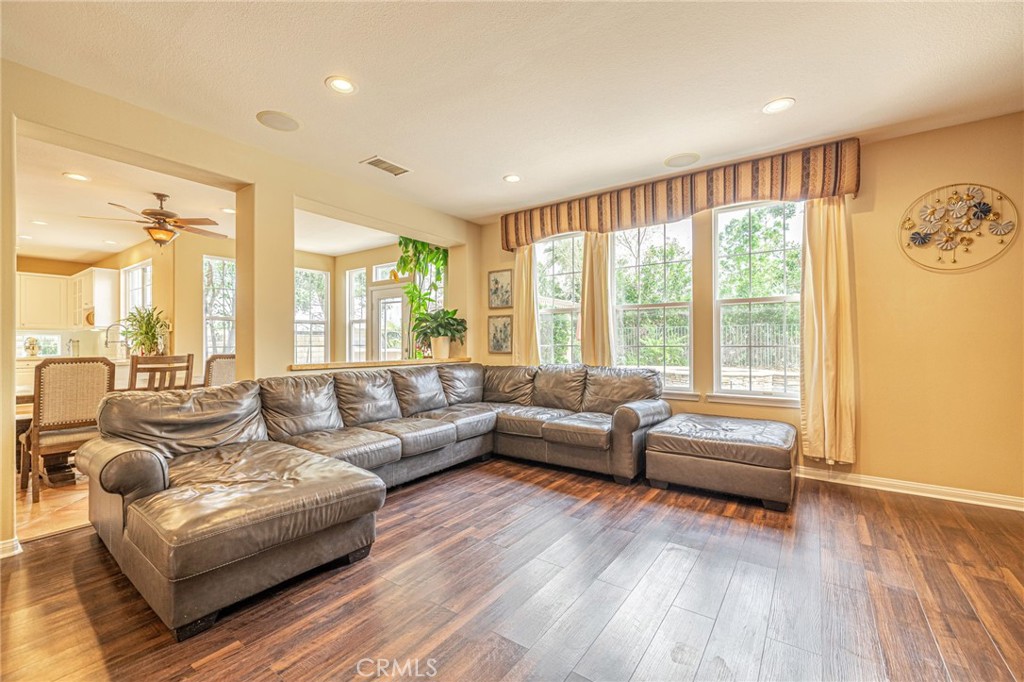 574 Oak Tree Court Simi Valley, CA 93065 - Photo 15 of 48 a living room with furniture and a large window