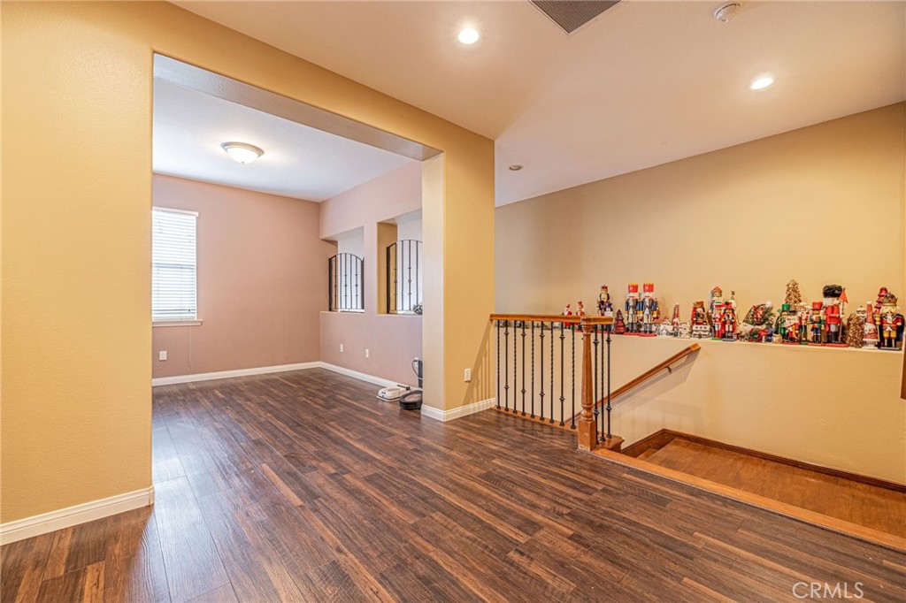 574 Oak Tree Court Simi Valley, CA 93065 - Photo 28 of 48 a view of a room with wooden floor