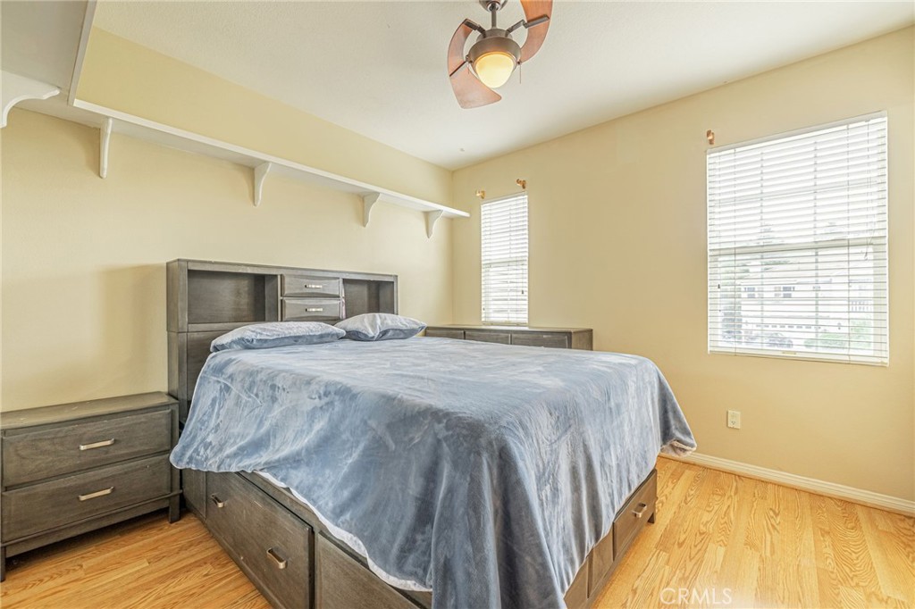 574 Oak Tree Court Simi Valley, CA 93065 - Photo 32 of 48 a bedroom with a bed and a window