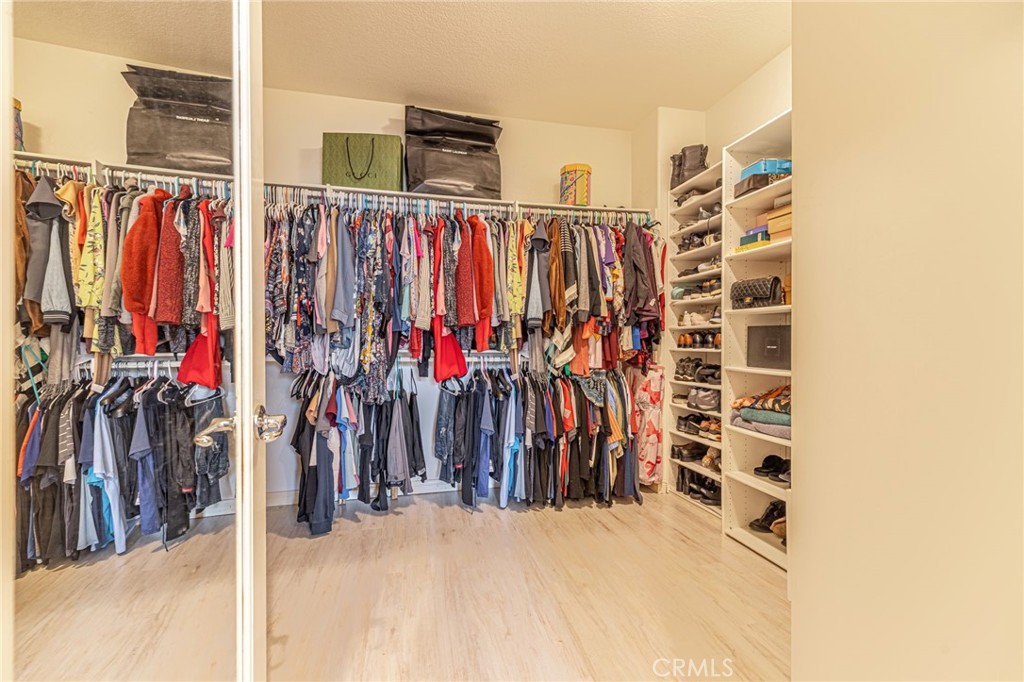 574 Oak Tree Court Simi Valley, CA 93065 - Photo 38 of 48 a view of walk in closet with clothes