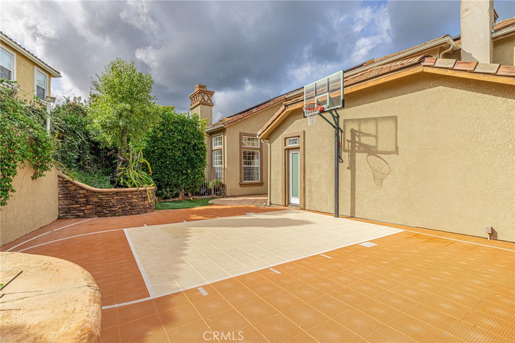 574 Oak Tree Court Simi Valley, CA 93065 - Photo 47 of 48 a house with trees in front of it