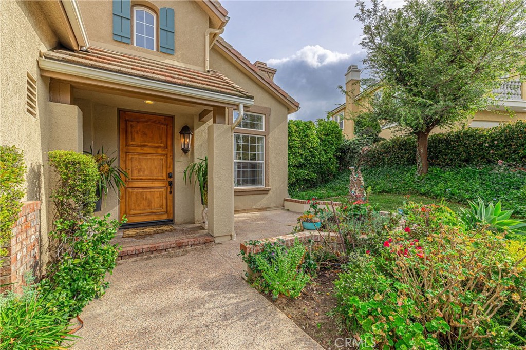 574 Oak Tree Court Simi Valley, CA 93065 - Photo 5 of 48 front view of a house with a yard