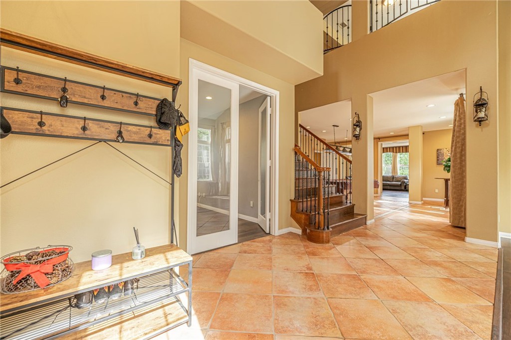 574 Oak Tree Court Simi Valley, CA 93065 - Photo 9 of 48 a view of a bedroom with wooden floor and entryway