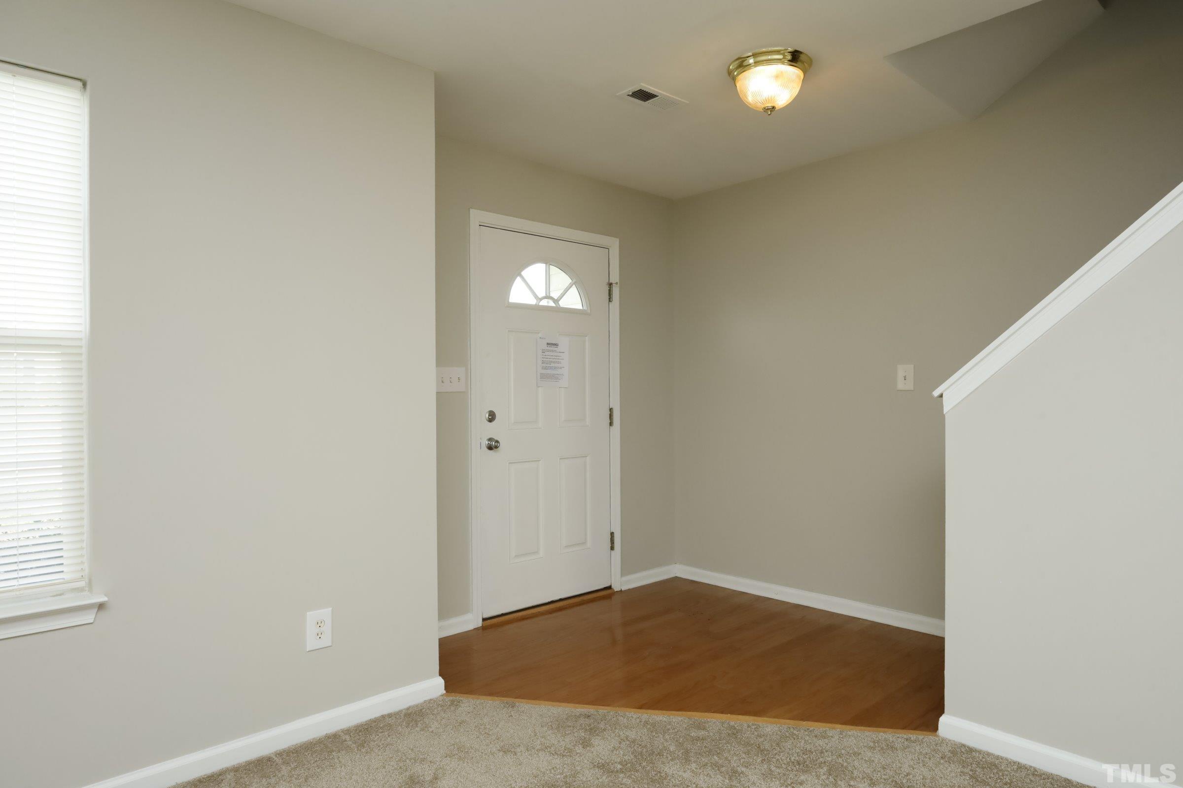 4014 Springfield Creek Drive Raleigh, NC 27616 - Photo 2 of 36 an empty room with windows and closet