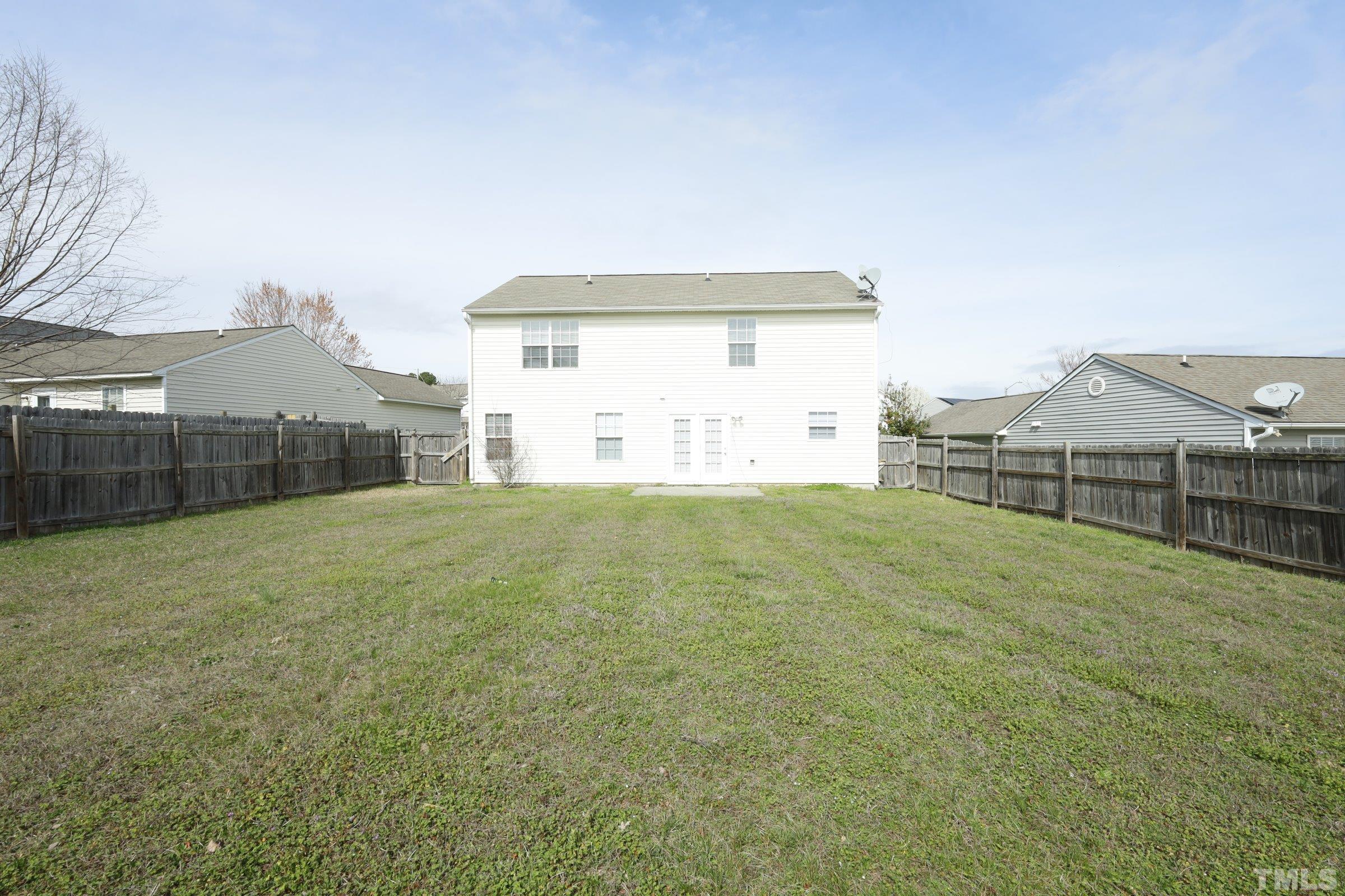 4014 Springfield Creek Drive Raleigh, NC 27616 - Photo 32 of 36 a view of a backyard
