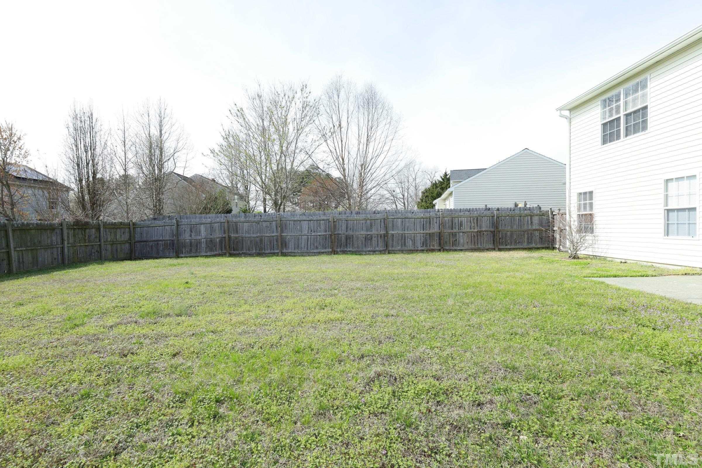 4014 Springfield Creek Drive Raleigh, NC 27616 - Photo 34 of 36 a view of outdoor space and yard