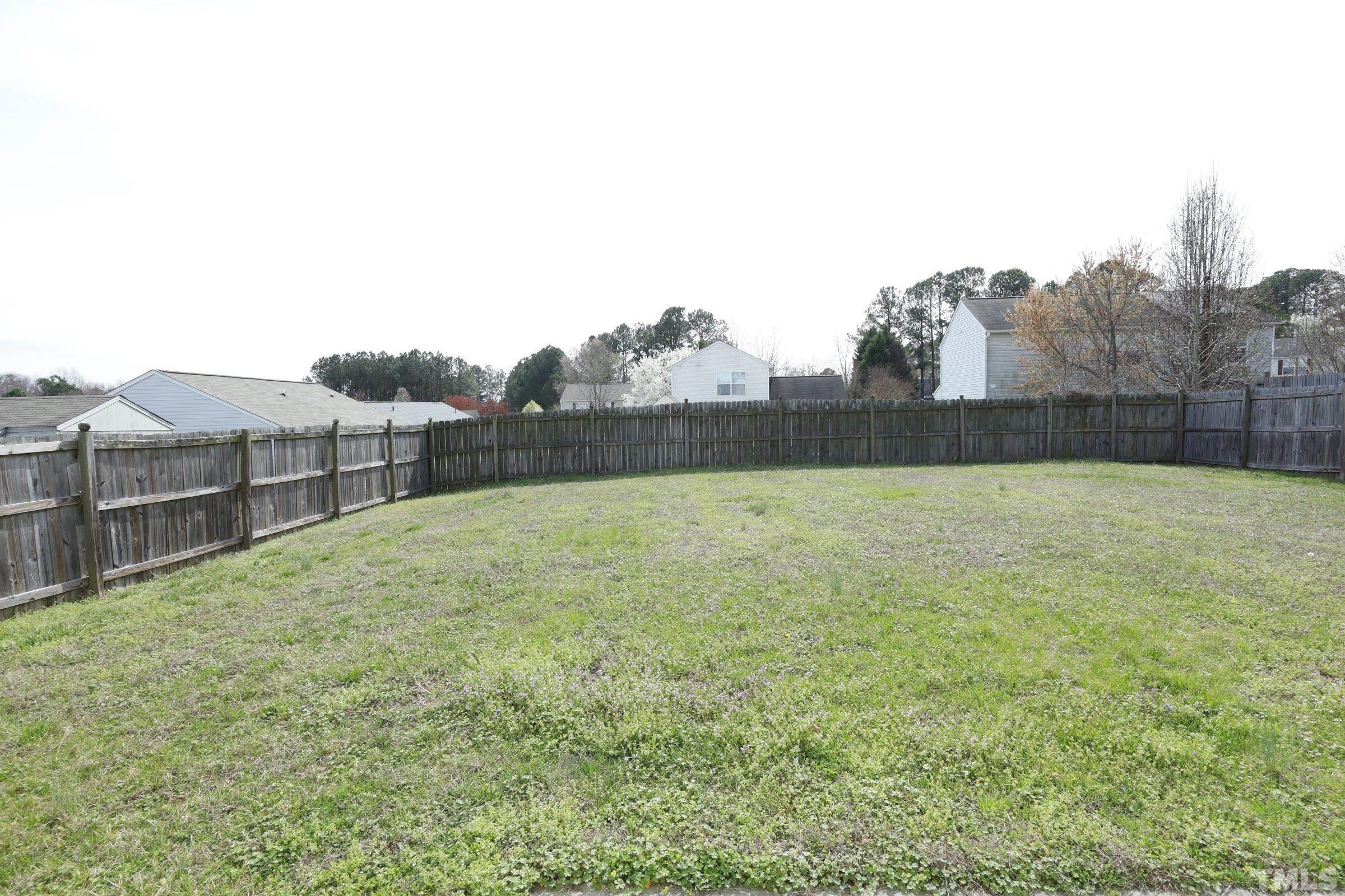 4014 Springfield Creek Drive Raleigh, NC 27616 - Photo 35 of 36 a view of a backyard