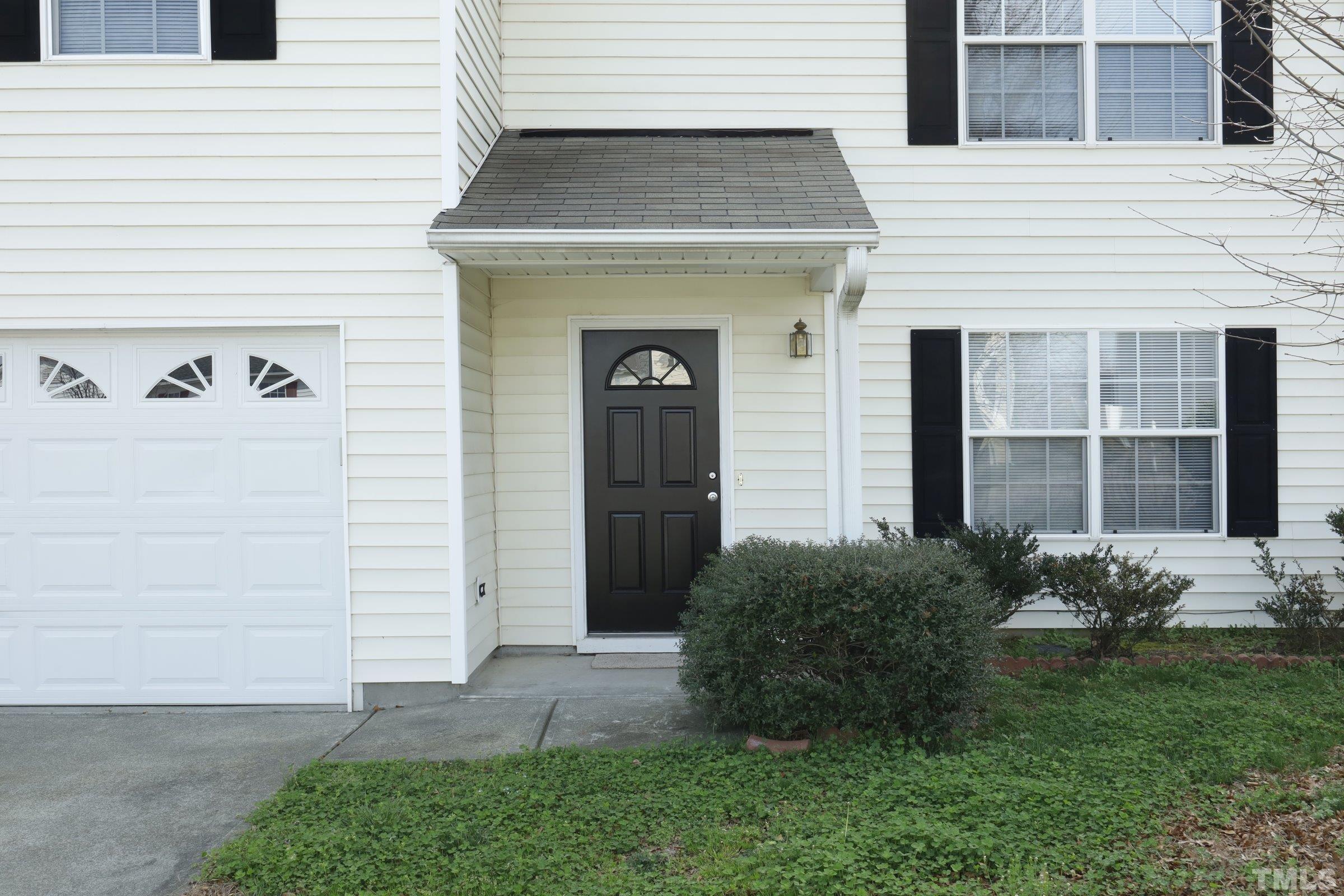 4014 Springfield Creek Drive Raleigh, NC 27616 - Photo 36 of 36 a front view of a house with garden