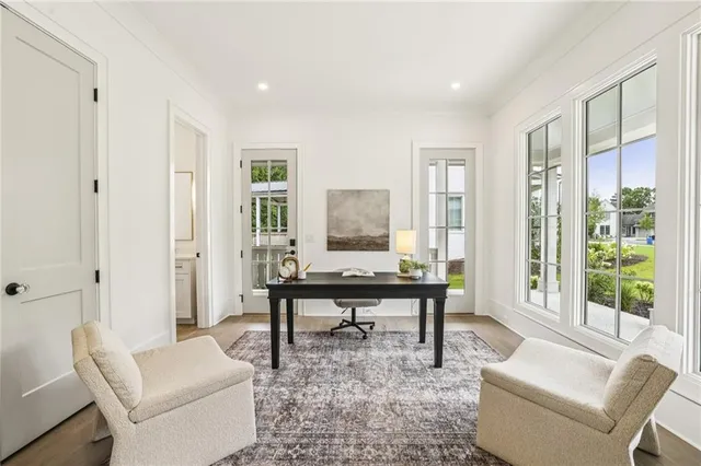 a living room with furniture and a table