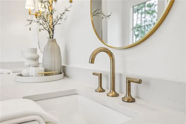 a kitchen with a sink cabinets and window