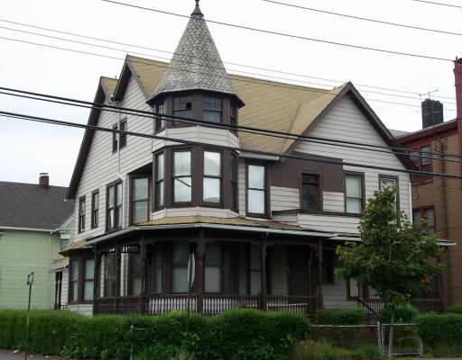 a front view of a house with yard