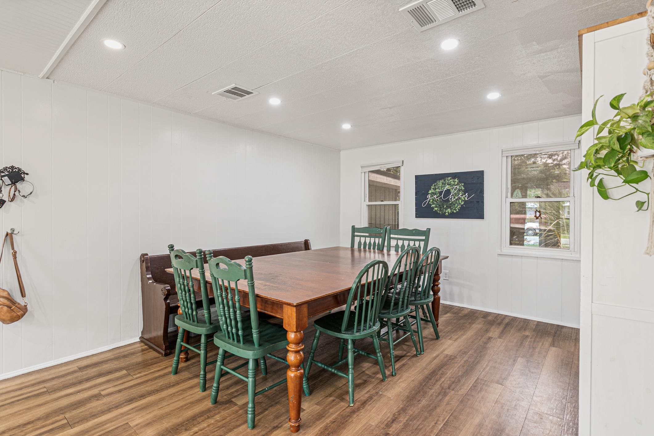 963 Catalina Road St. Augustine, FL 32086 - Photo 11 of 59 a view of a dining room with furniture and wooden floor
