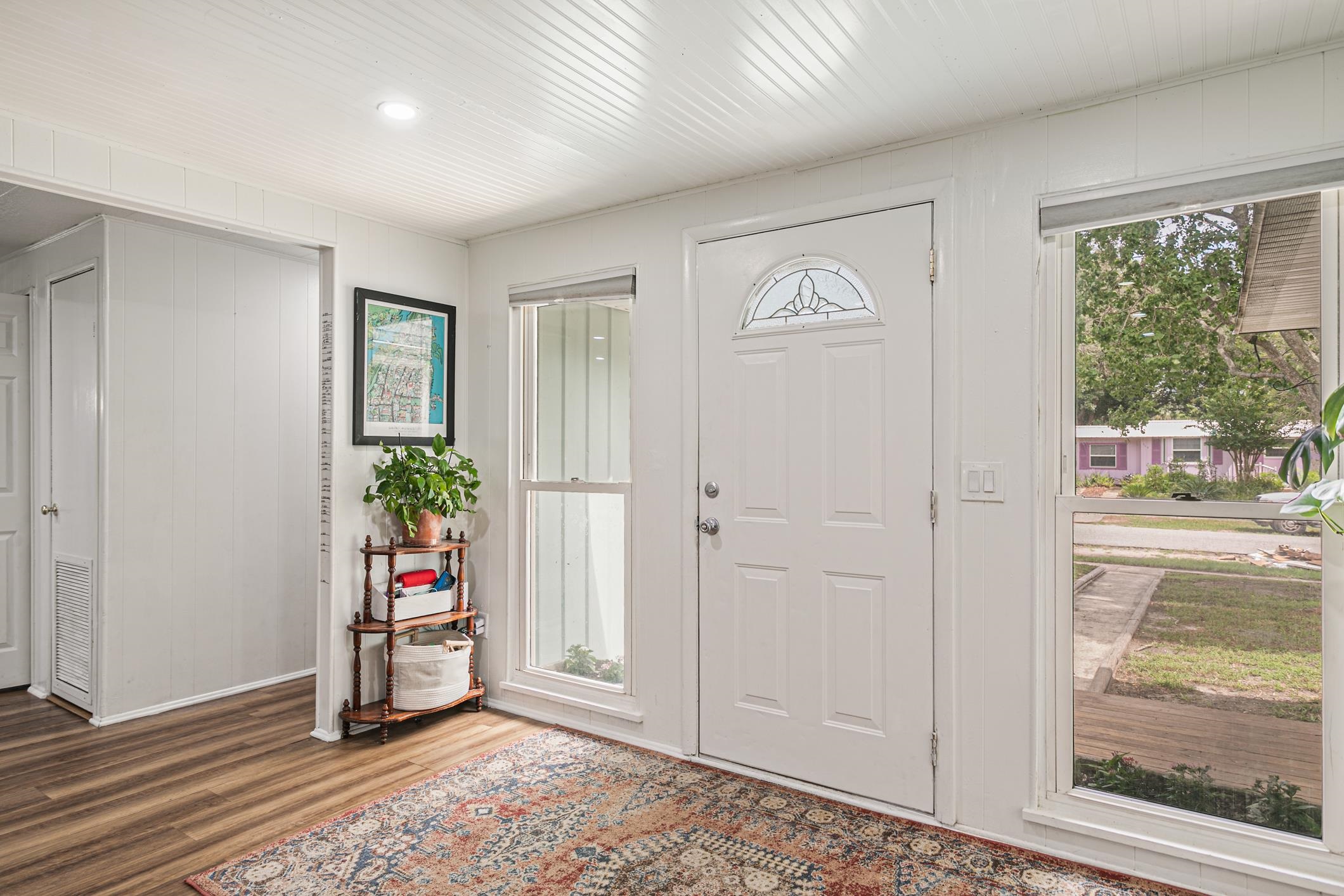 963 Catalina Road St. Augustine, FL 32086 - Photo 13 of 59 en empty room with window and front door
