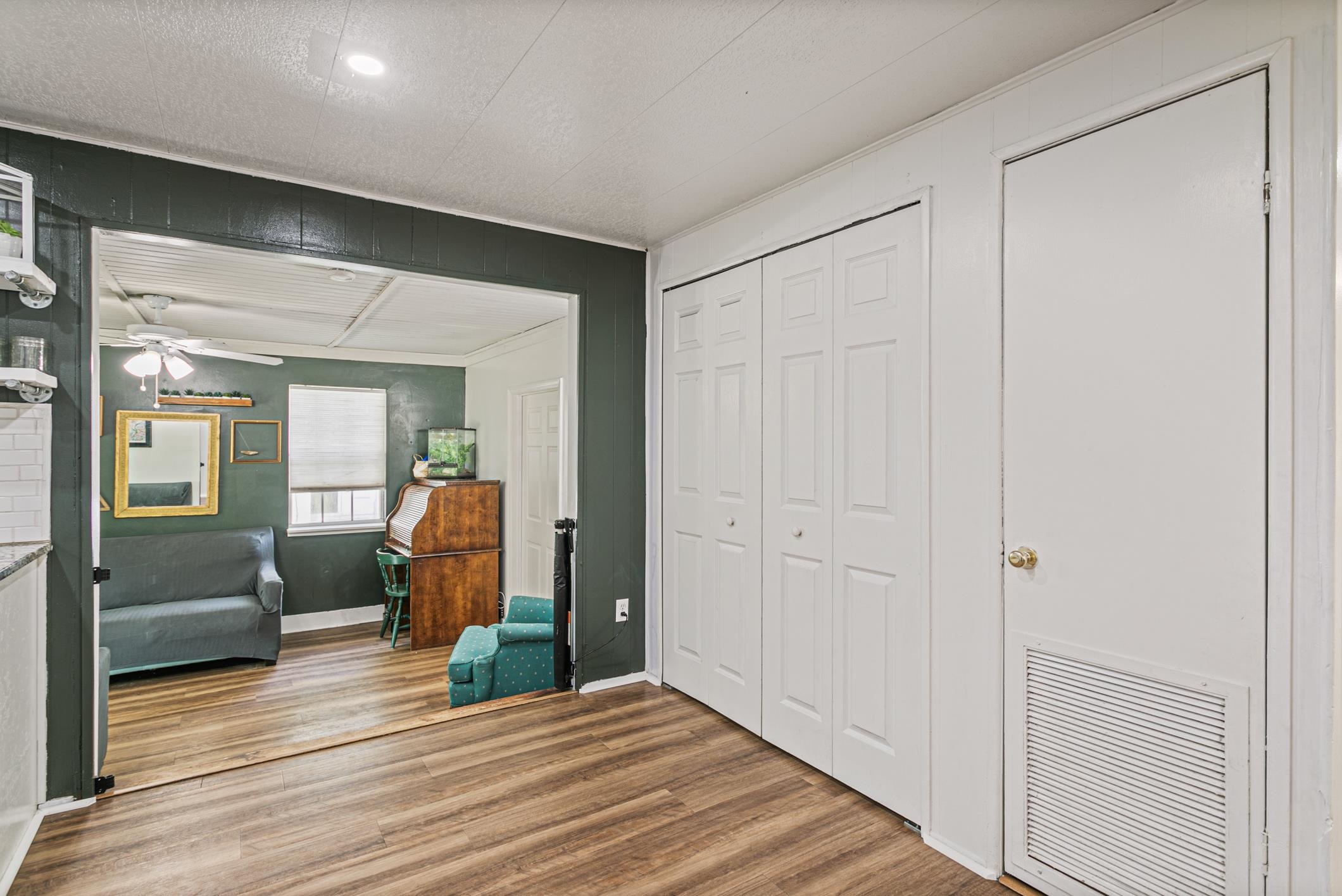 963 Catalina Road St. Augustine, FL 32086 - Photo 19 of 59 a view of a livingroom from a hallway