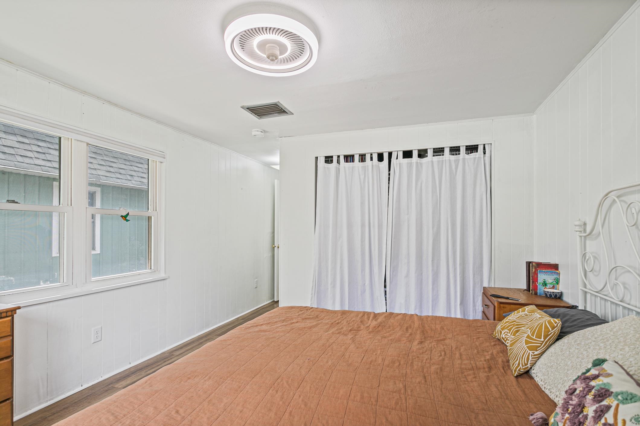 963 Catalina Road St. Augustine, FL 32086 - Photo 30 of 59 a bedroom with a bed and a window