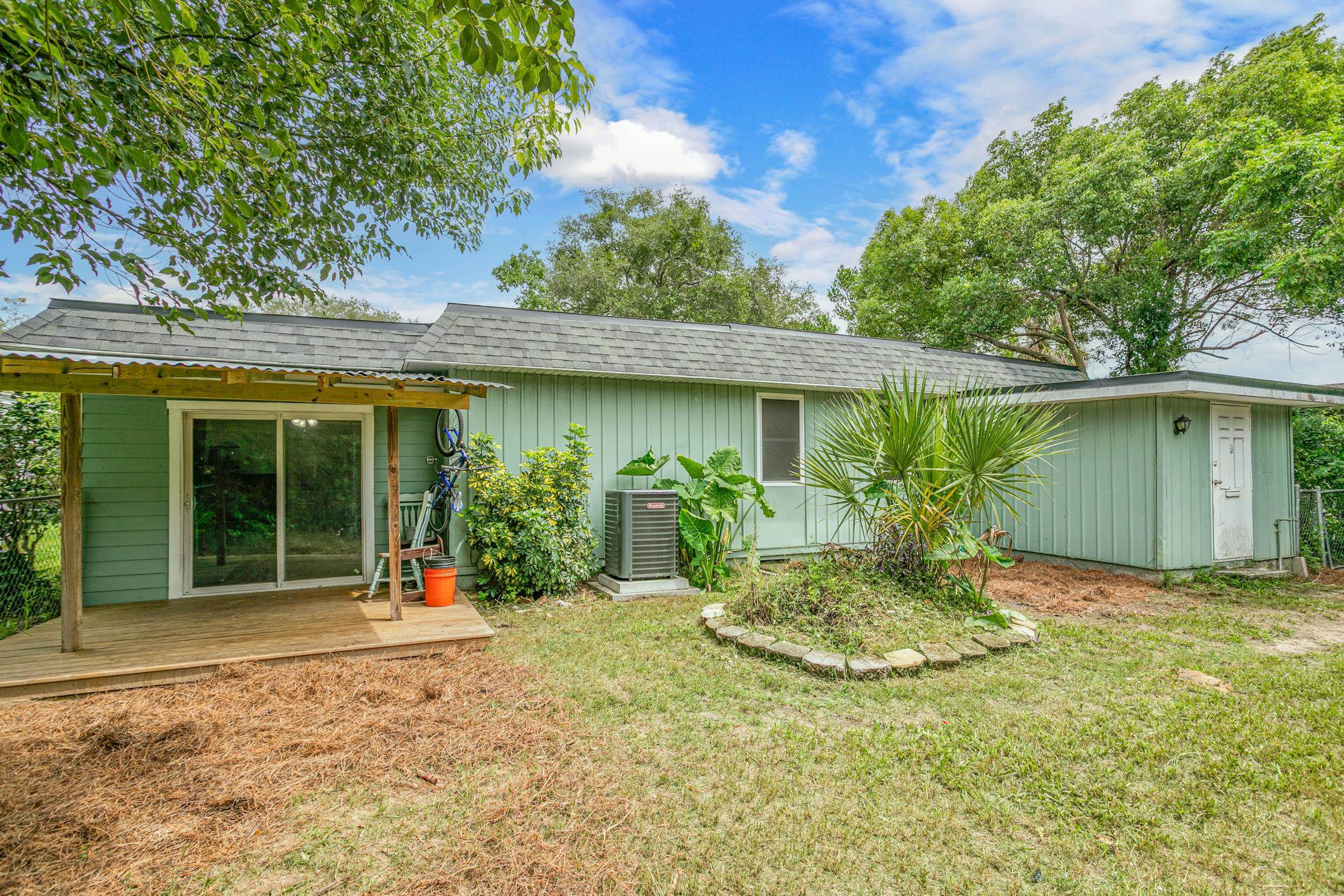 963 Catalina Road St. Augustine, FL 32086 - Photo 32 of 59 a front view of a house with garden