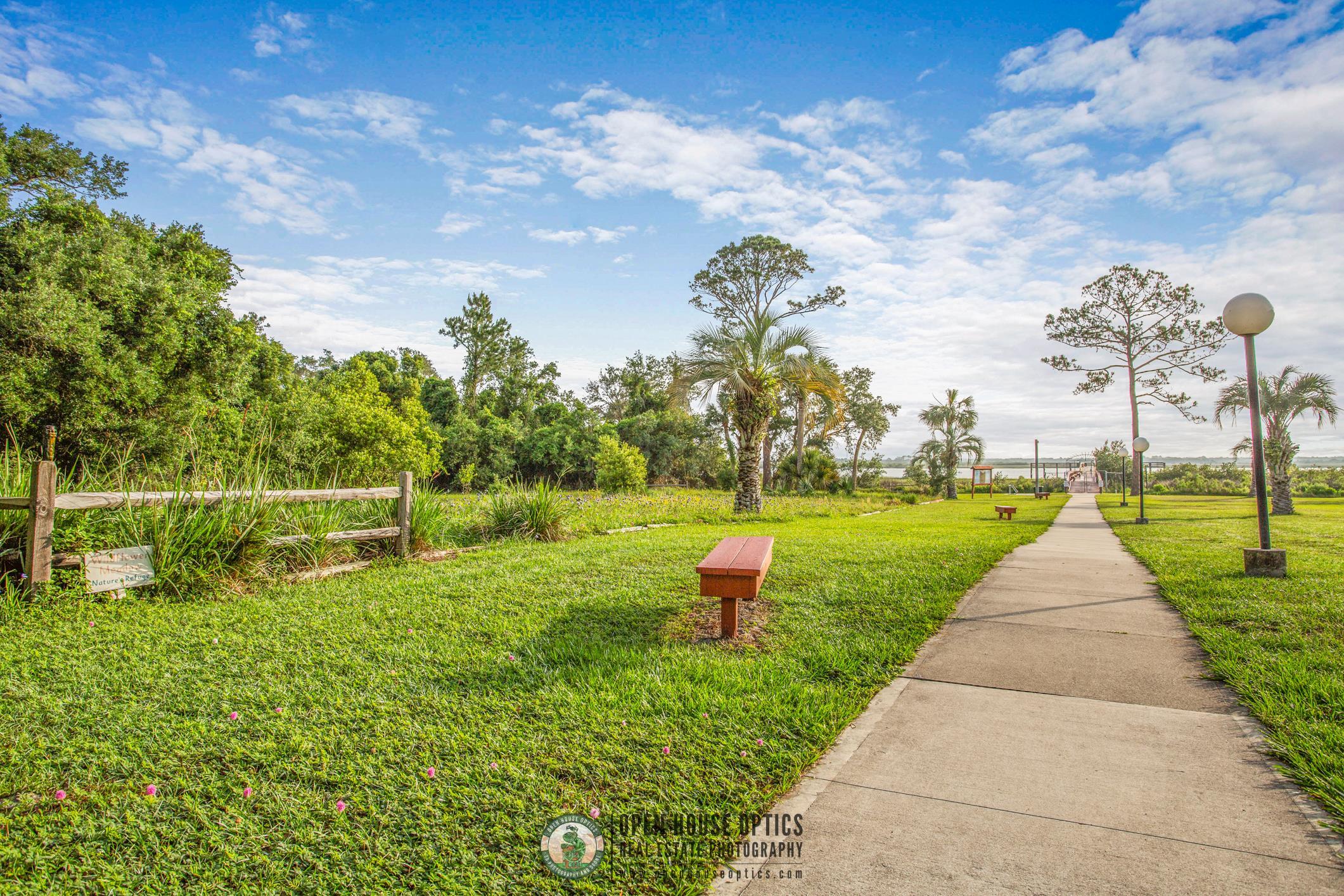 963 Catalina Road St. Augustine, FL 32086 - Photo 46 of 59 a park with lots of green space pathway and plants