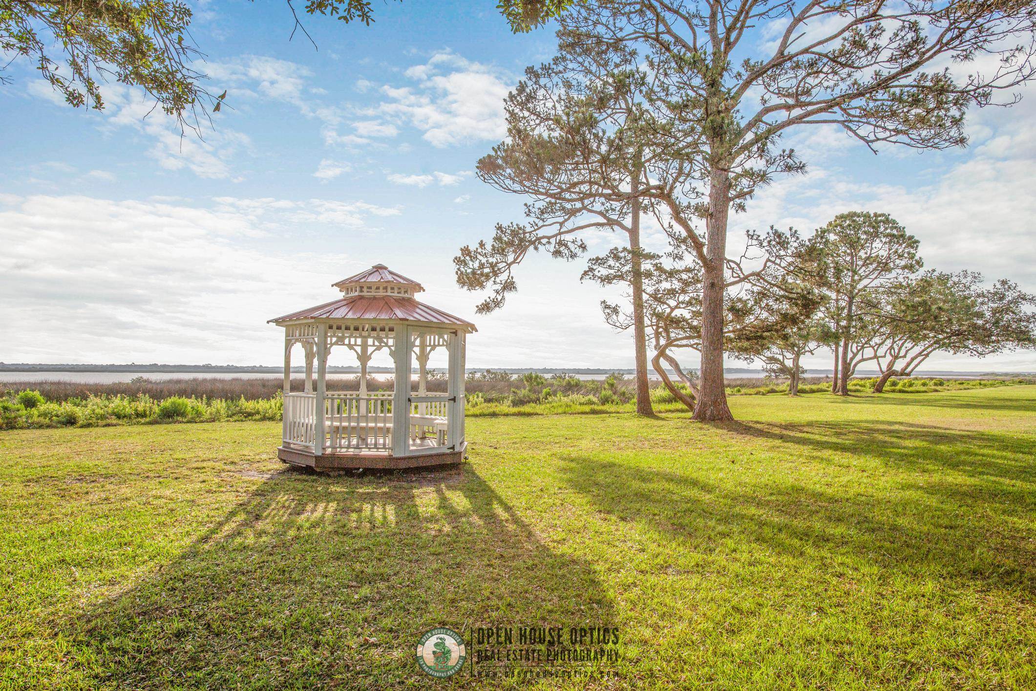 963 Catalina Road St. Augustine, FL 32086 - Photo 48 of 59 a view of a large yard with an ocean view