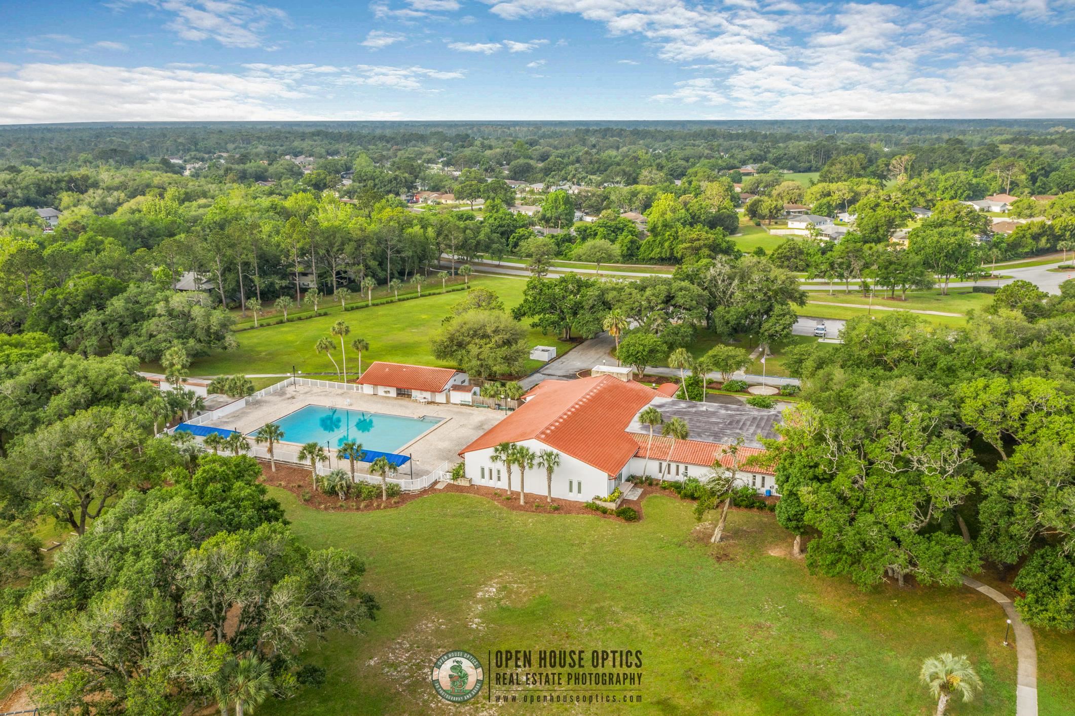 963 Catalina Road St. Augustine, FL 32086 - Photo 58 of 59 an aerial view of residential houses with outdoor space and swimming pool