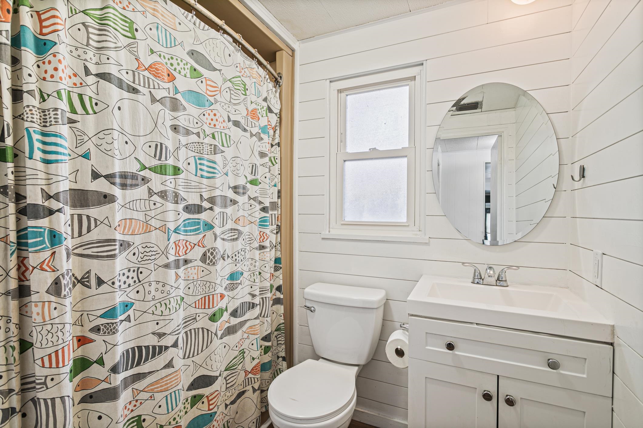 963 Catalina Road St. Augustine, FL 32086 - Photo 7 of 59 a bathroom with a sink toilet and shower