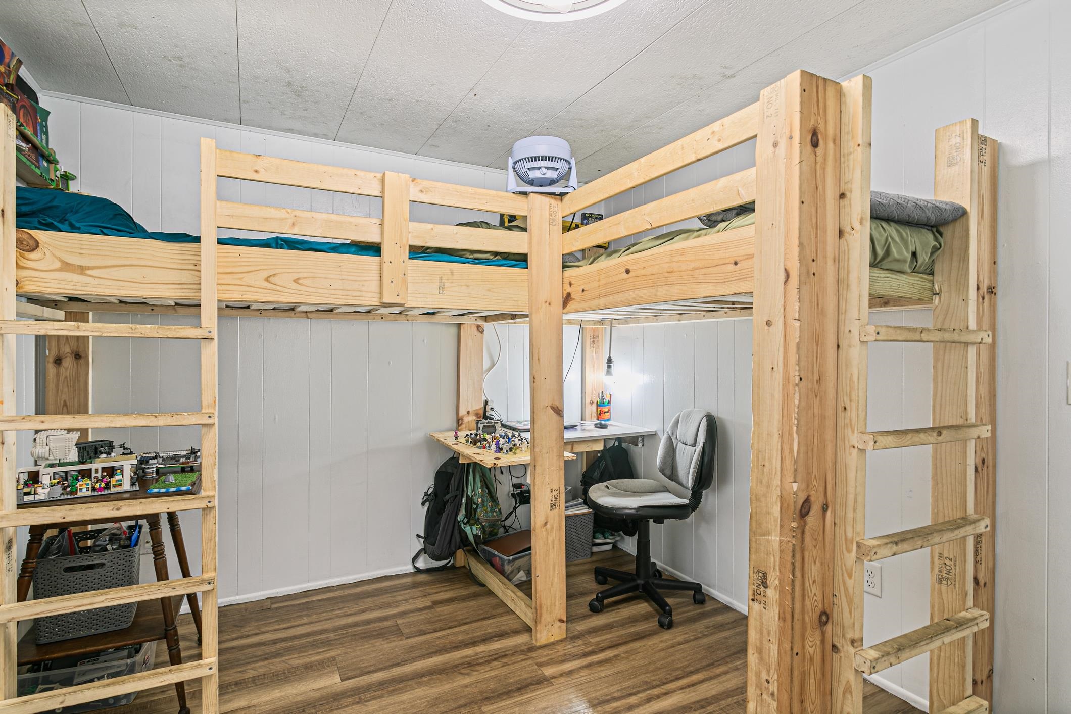 963 Catalina Road St. Augustine, FL 32086 - Photo 10 of 59 a view of a hallway to room with wooden floor and windows