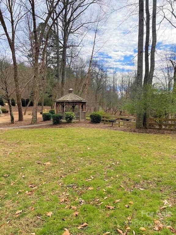 0 Cross Ridge Drive, Unit 120 Rutherfordton, NC 28139 - Photo 20 of 26 a view of a lake with houses