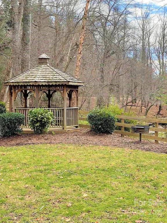 0 Cross Ridge Drive, Unit 120 Rutherfordton, NC 28139 - Photo 21 of 26 a view of a house with pool and sitting area