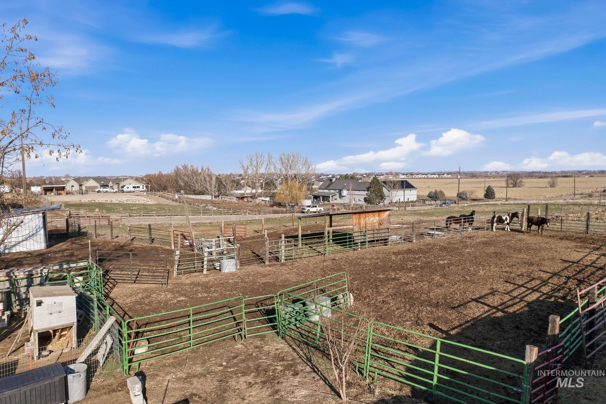 603 East King Road Kuna, ID 83634 - Photo 11 of 22 View of yard with a view of rural / pastoral area, an exterior structure, and an outbuilding