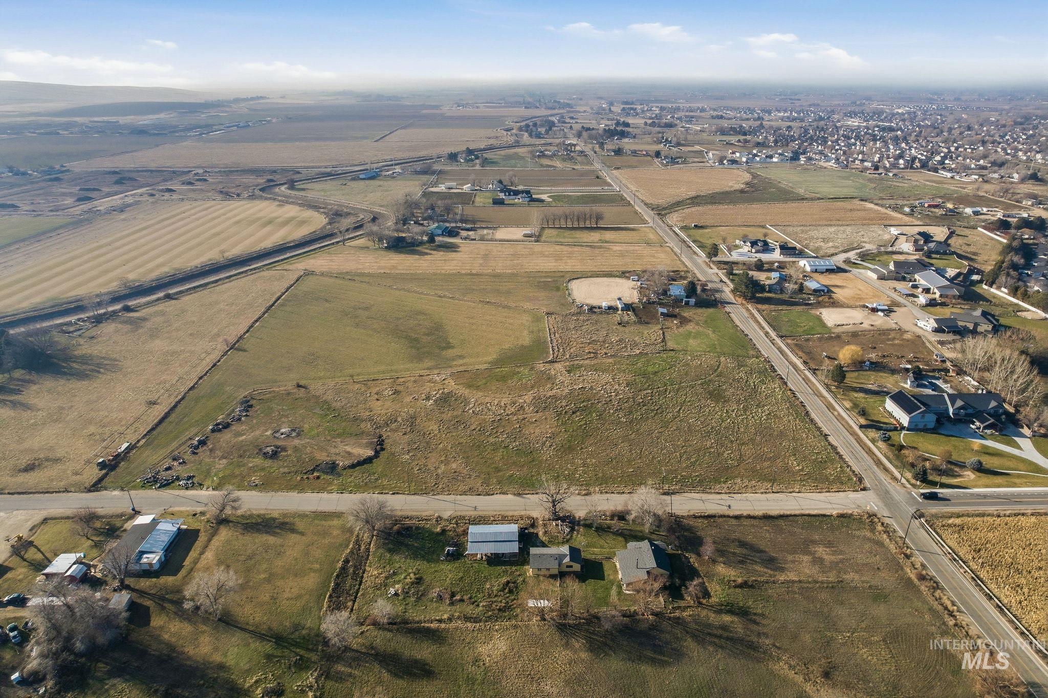 603 East King Road Kuna, ID 83634 - Photo 4 of 22 Aerial view of property and surrounding area with rural landscape