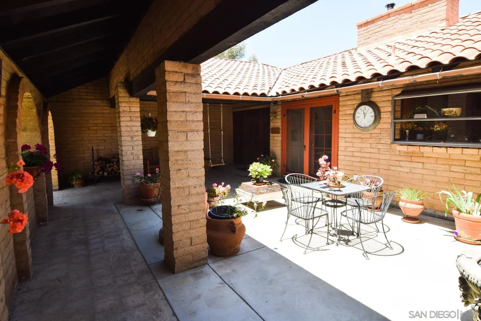 23684 Viejas Grade Road Descanso, CA 91916 - Photo 3 of 54 a view of a patio with table and chairs