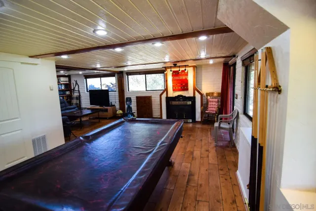 a bathroom with a tub and shower