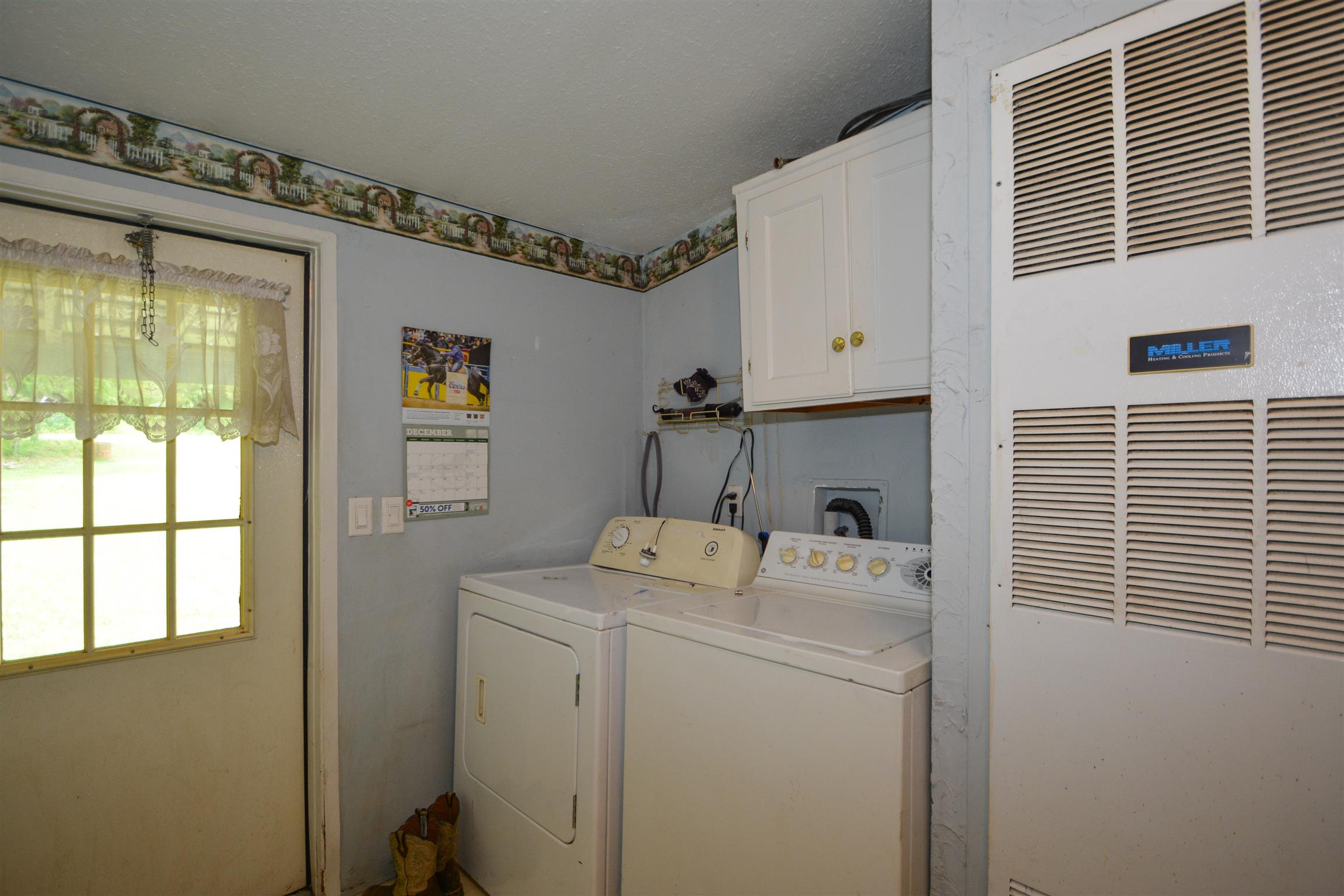 789 Speck Road Lebanon, TN 37087 - Photo 21 of 28 a utility room with dryer and washer