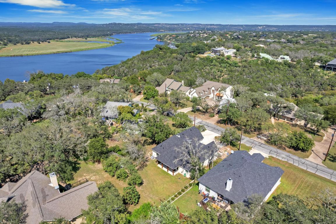 326 Coventry Road Spicewood, TX 78669 - Photo 1 of 30 an aerial view of residential houses with outdoor space