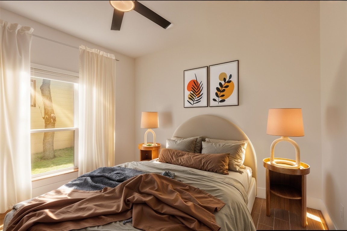 326 Coventry Road Spicewood, TX 78669 - Photo 22 of 30 a bedroom with a bed and a window