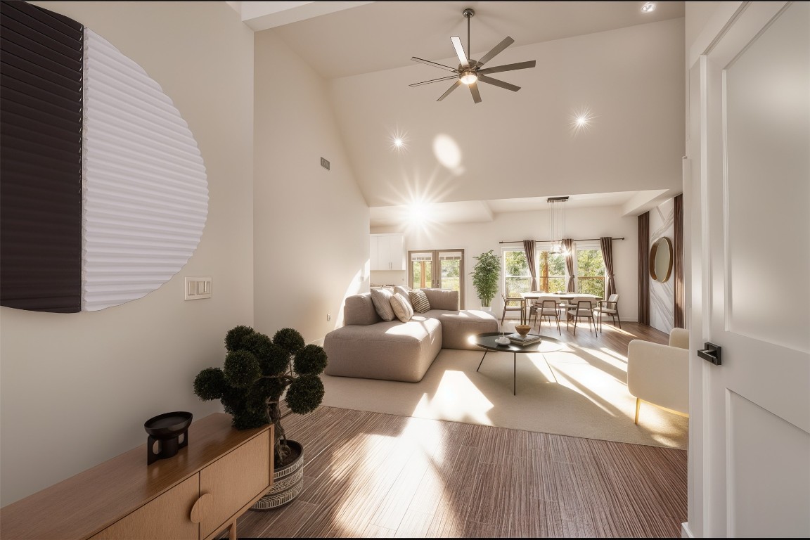 326 Coventry Road Spicewood, TX 78669 - Photo 5 of 30 a living room with furniture and a large window