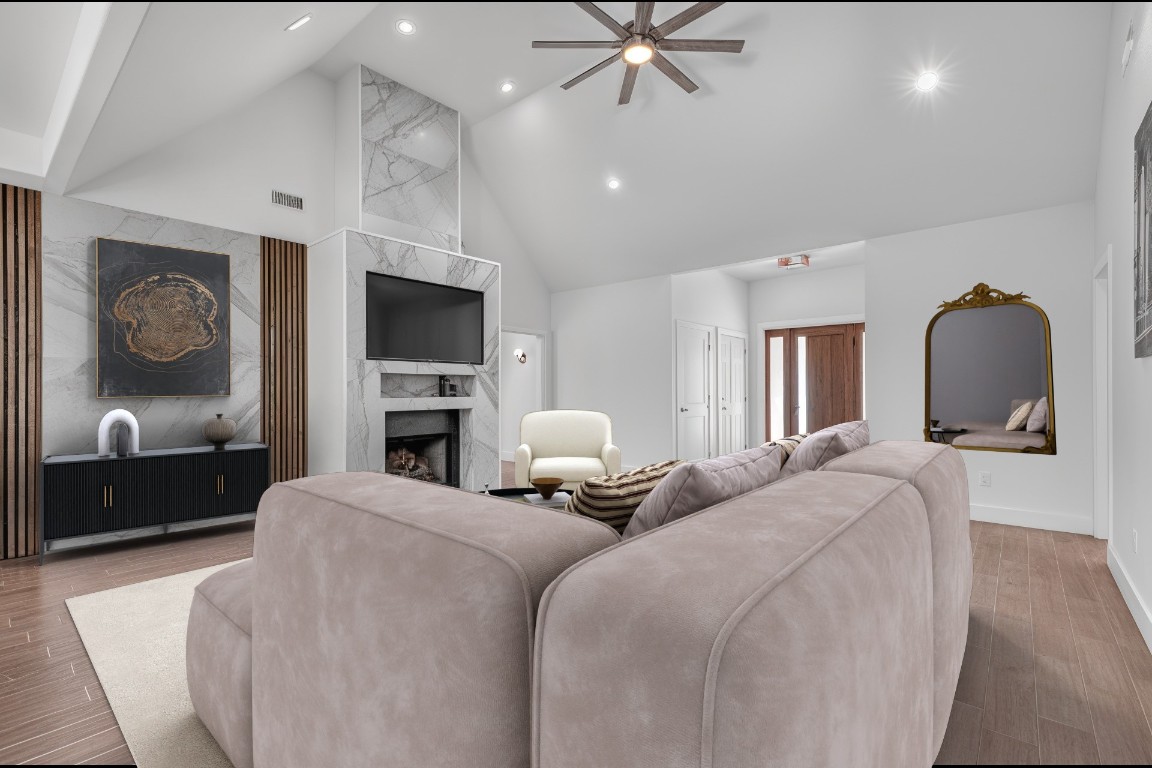 326 Coventry Road Spicewood, TX 78669 - Photo 7 of 30 a bedroom with bed and a chandelier