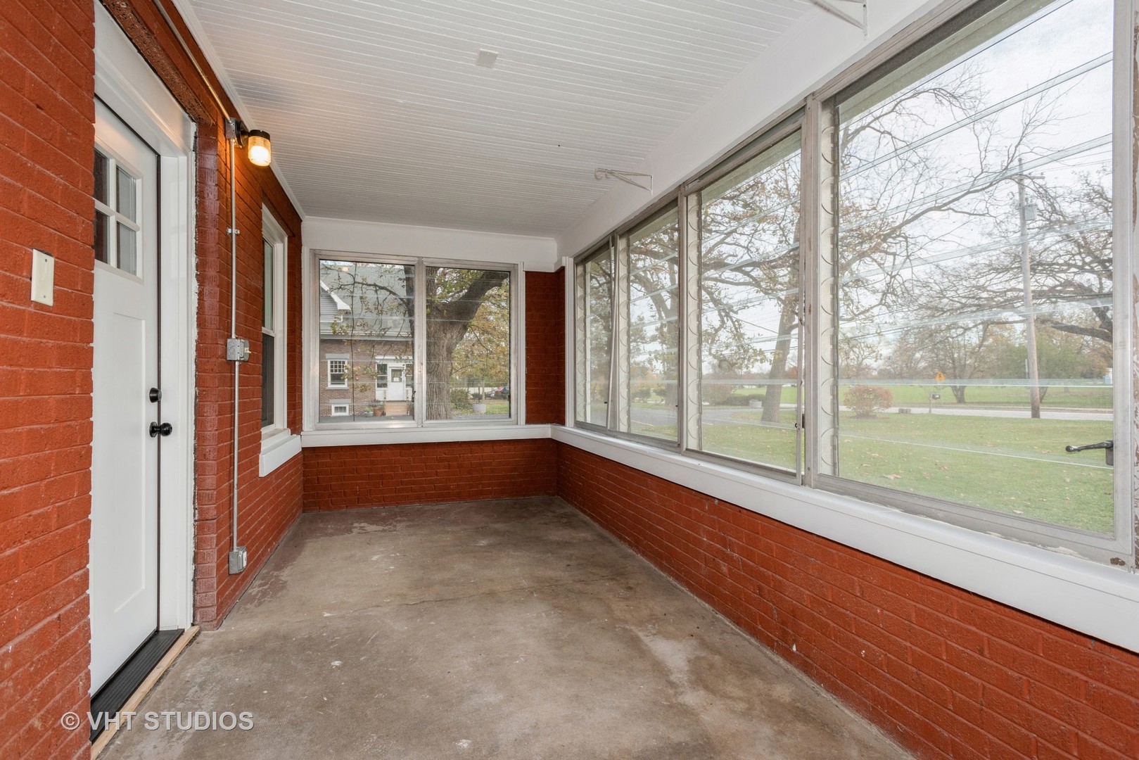 381 Sullivan Road North Aurora, IL 60542 - Photo 15 of 29 a view of room with large windows and a table