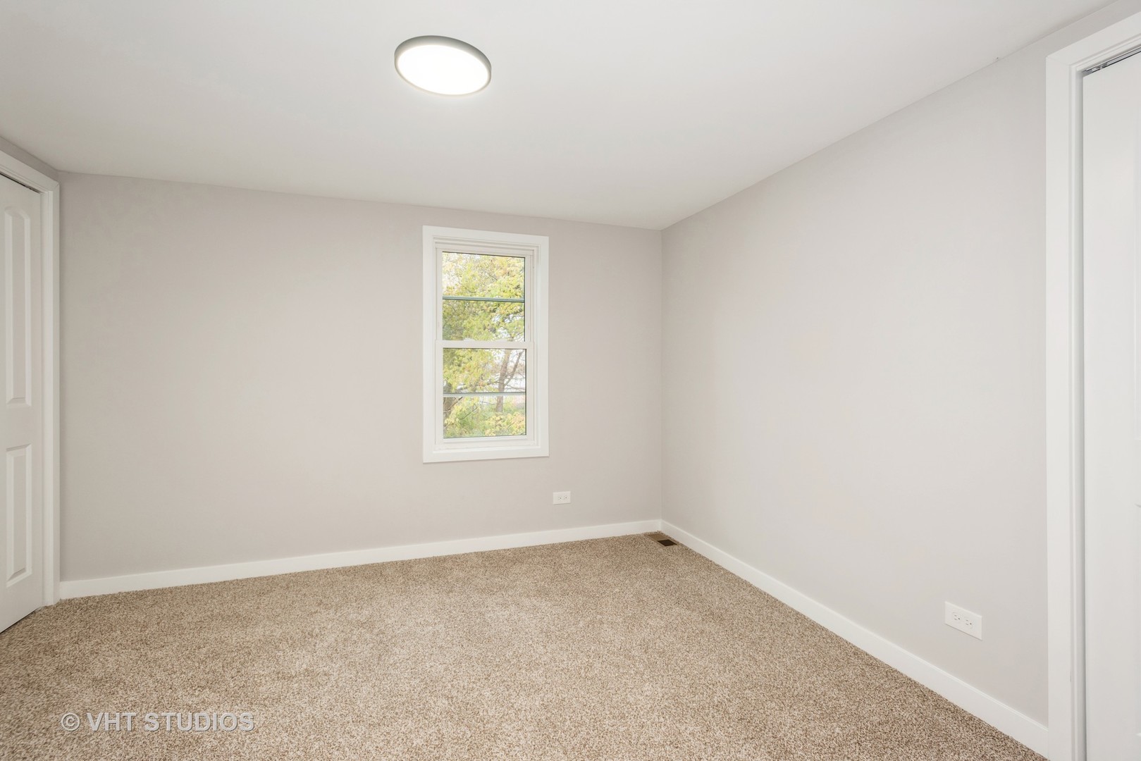 381 Sullivan Road North Aurora, IL 60542 - Photo 16 of 29 an empty room with a window