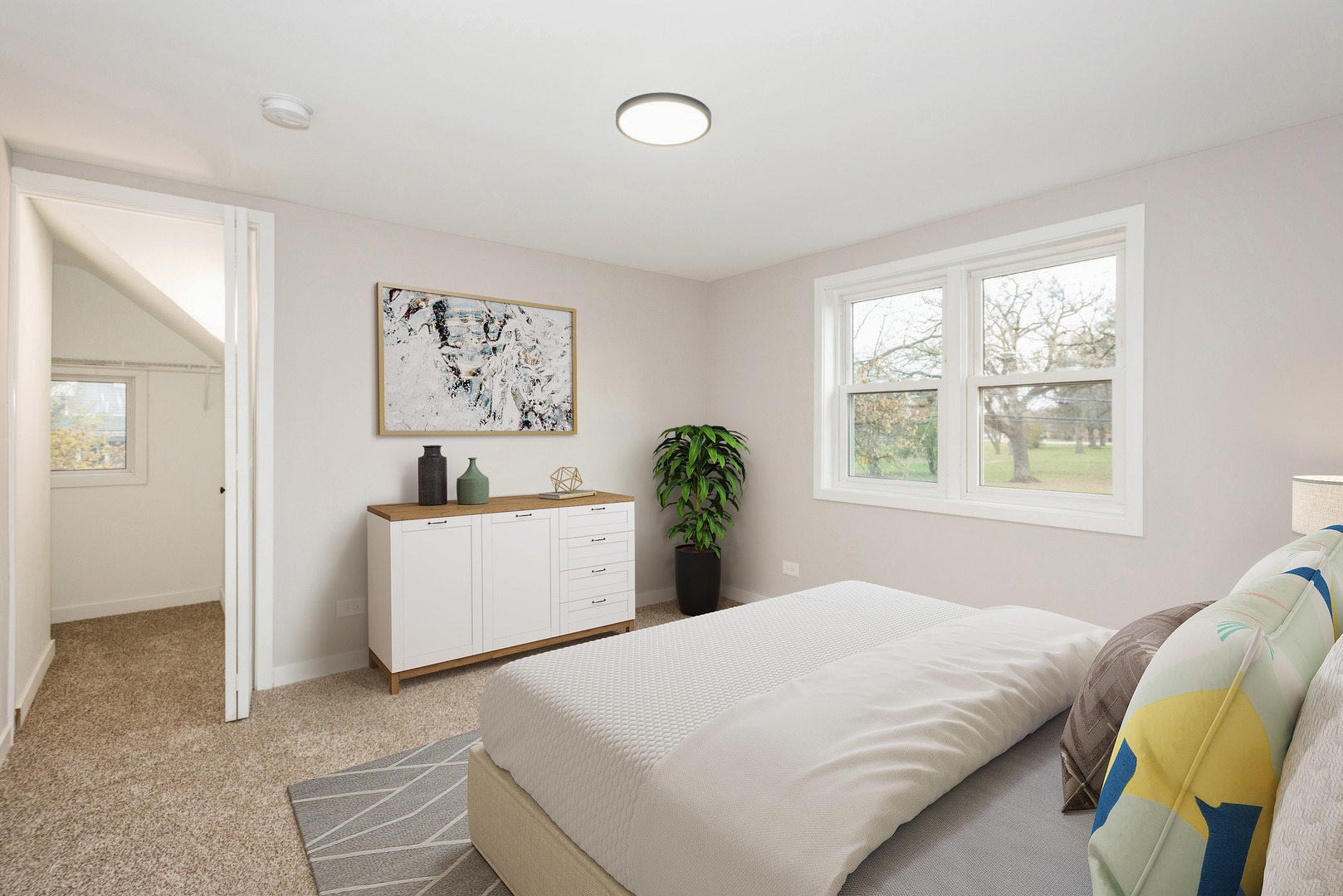 381 Sullivan Road North Aurora, IL 60542 - Photo 18 of 29 a bedroom with a large bed and a window