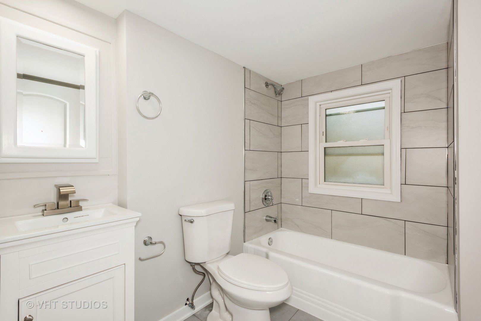 381 Sullivan Road North Aurora, IL 60542 - Photo 19 of 29 a bathroom with a sink toilet and shower