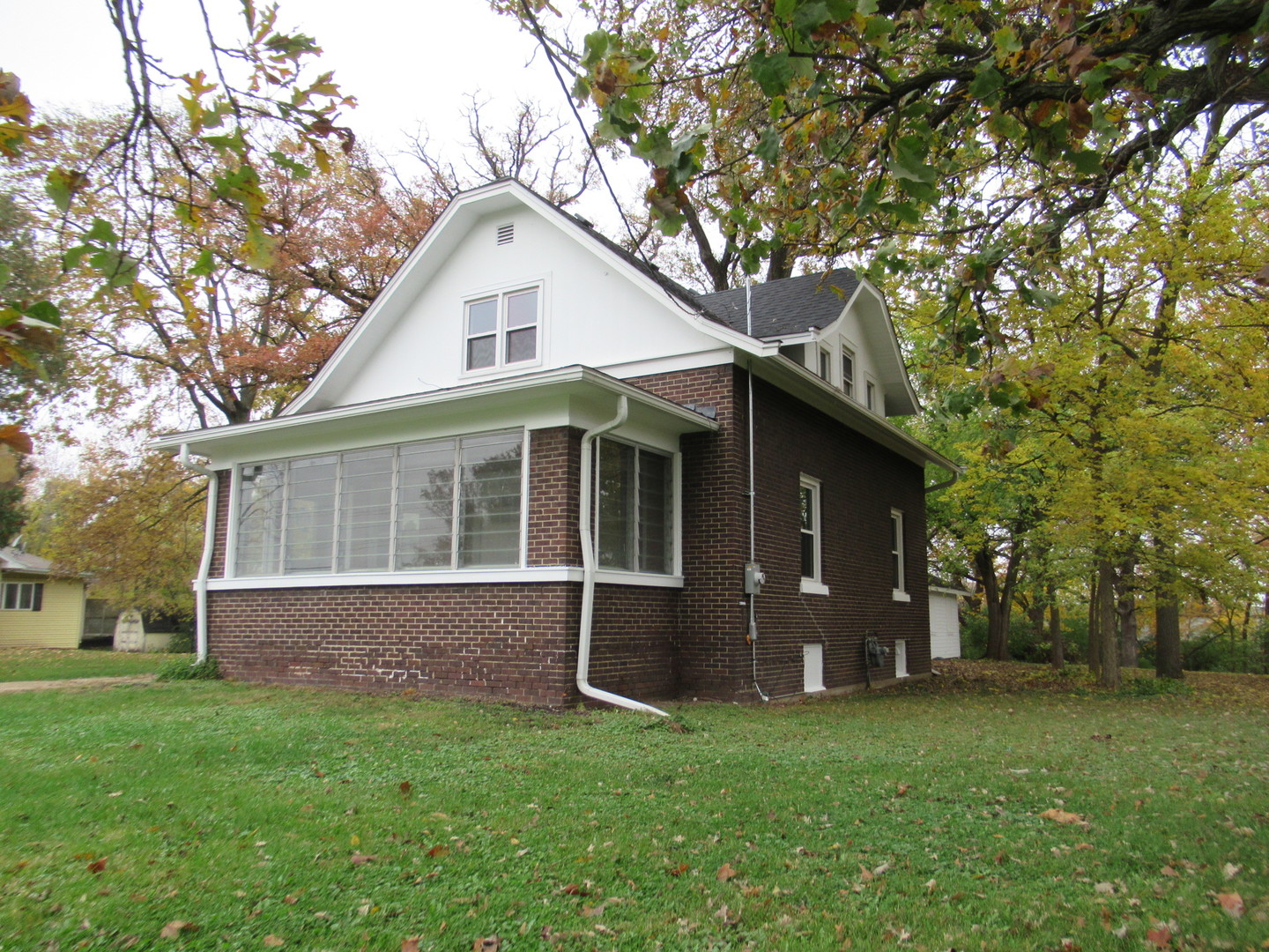 381 Sullivan Road North Aurora, IL 60542 - Photo 28 of 29 a front view of house with yard and green space