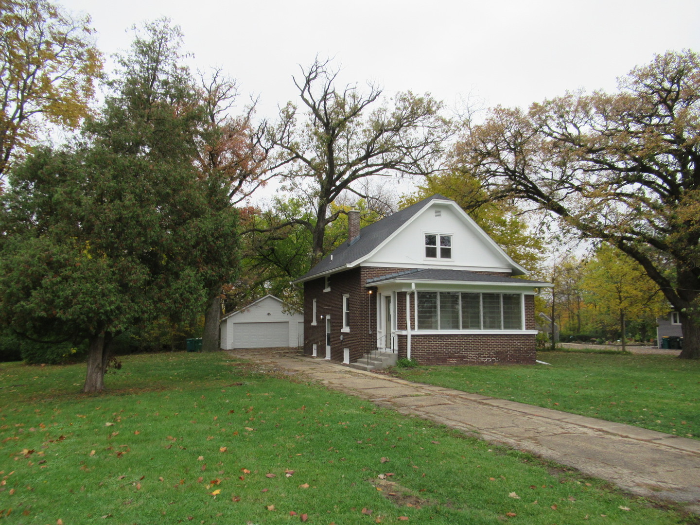 381 Sullivan Road North Aurora, IL 60542 - Photo 29 of 29 a front view of a house with a yard