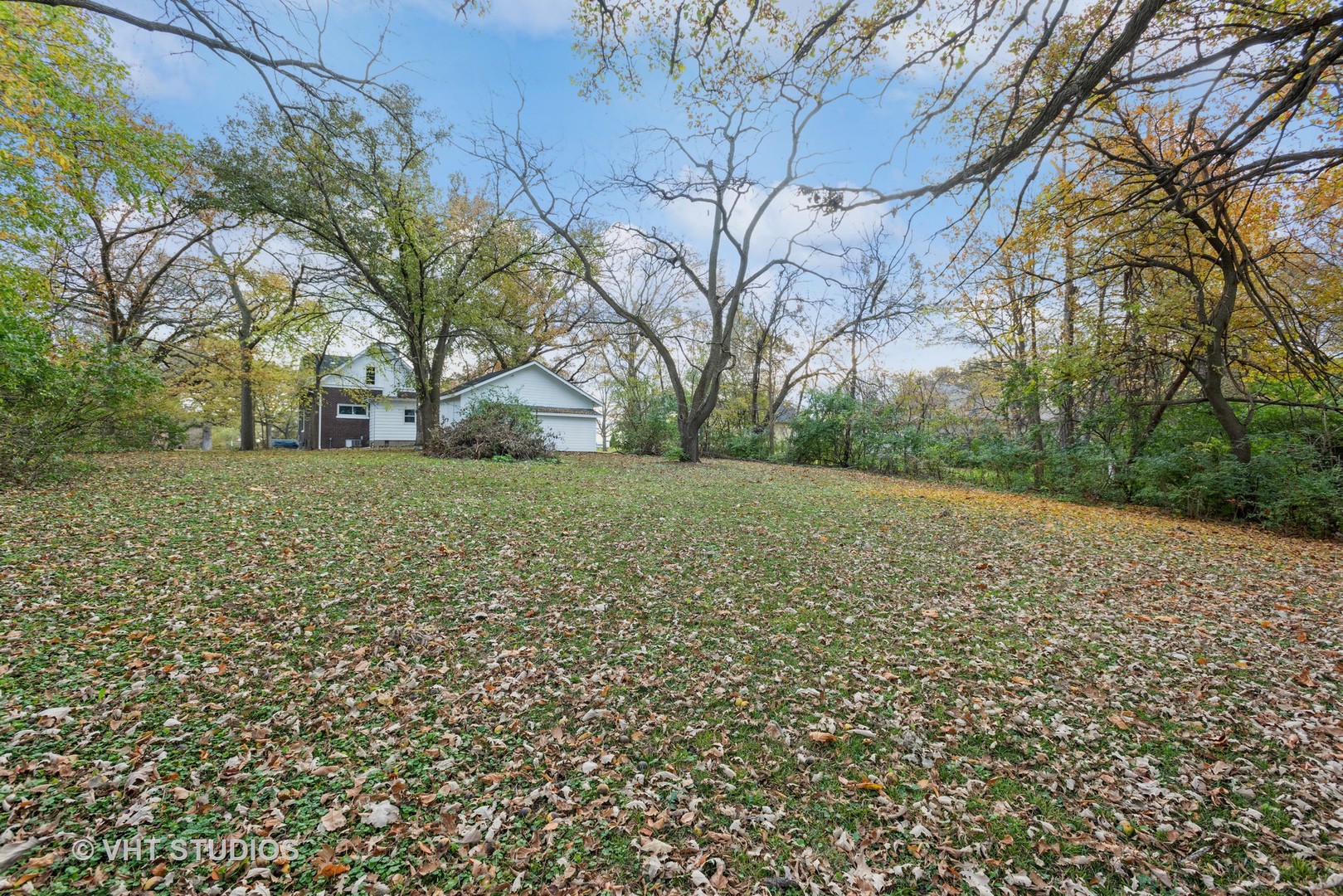 381 Sullivan Road North Aurora, IL 60542 - Photo 3 of 29 a view of a yard with a house