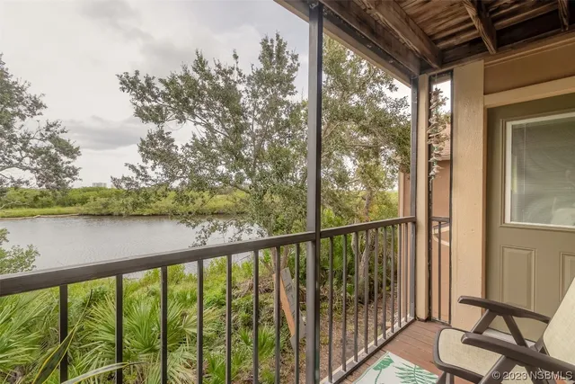 a view of a balcony with lake view