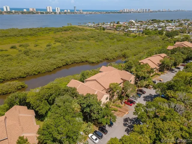 a view of an ocean and city