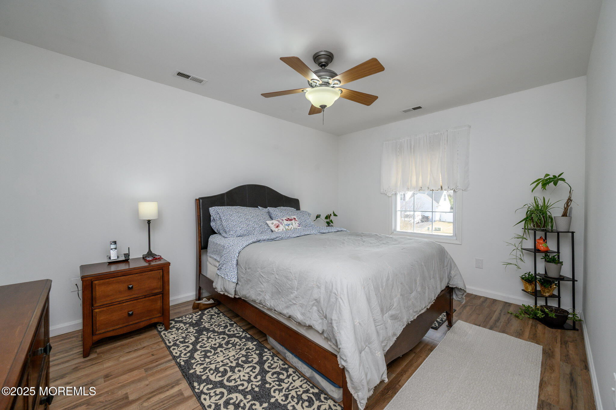 56 Crater Lake Road Howell, NJ 07731 - Photo 31 of 43 a bedroom with a bed and closet